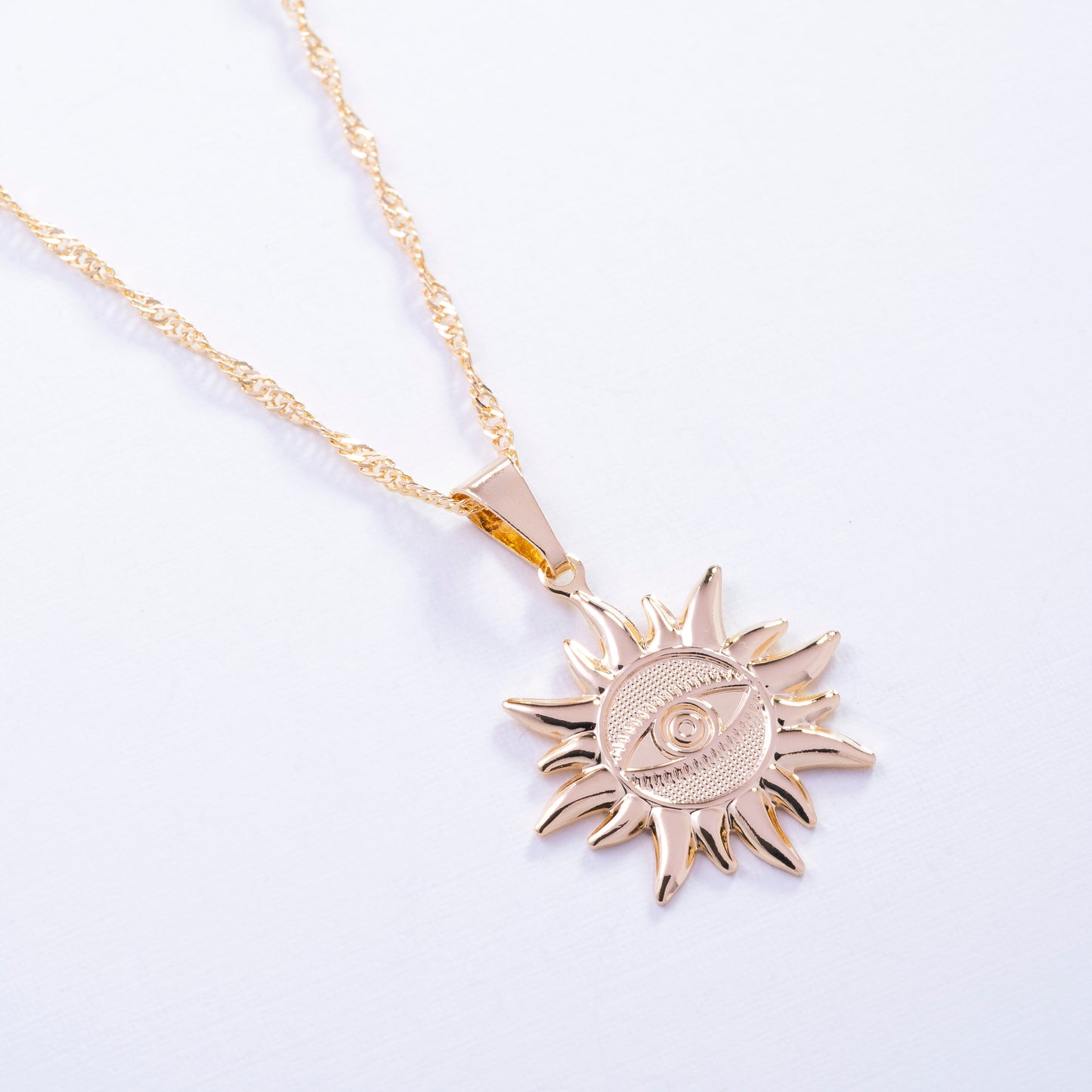 Dije de sol enchapado en Goldfield