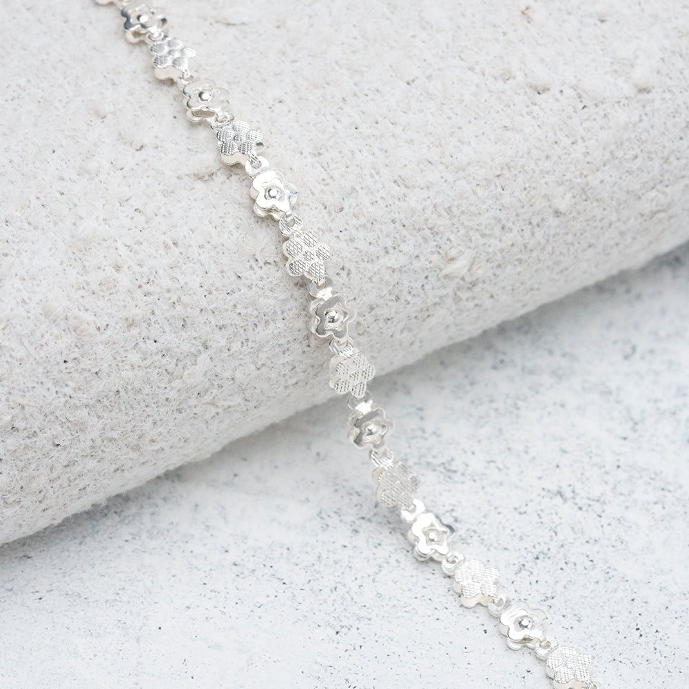 Pulsera tejida de flores en Plata
