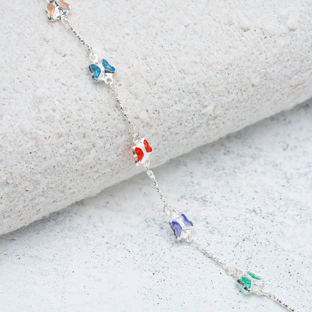 Pulsera tejida mariposas coloridas en Plata