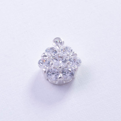 Dije flor mini con circones en Plata