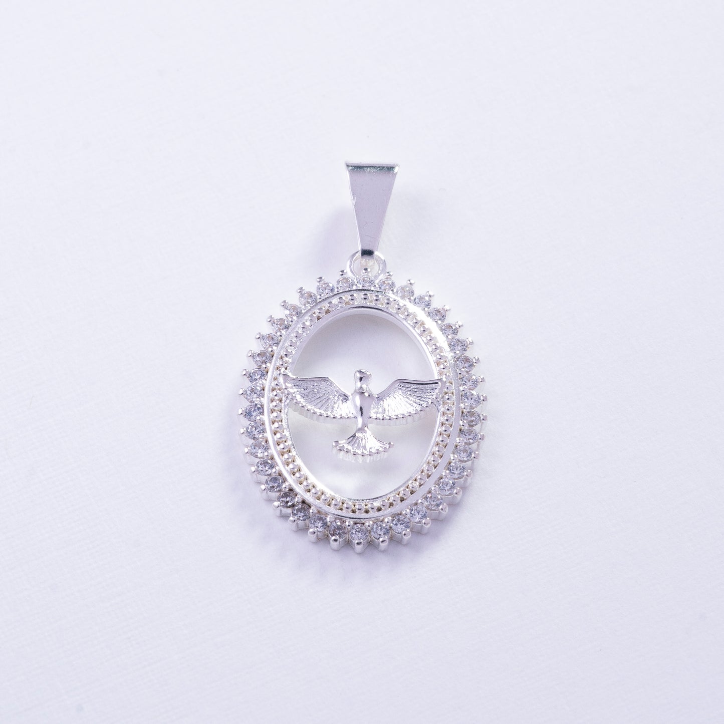 Dije ovalado de fénix con circones en Plata