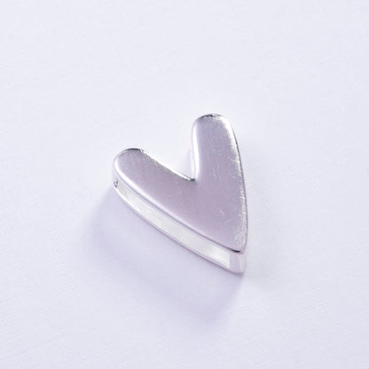 Dije de corazón pulido en Plata