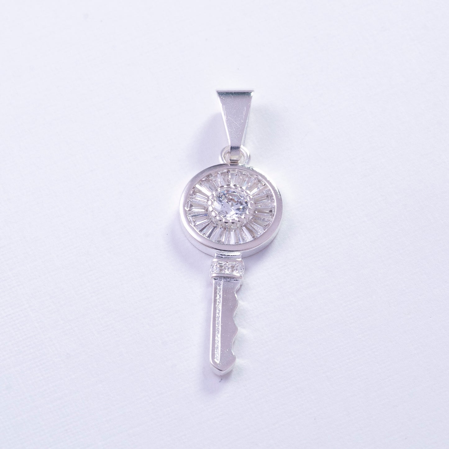 Dije de llave en Plata