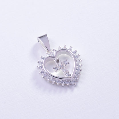 Dije cruz con corazón en Plata