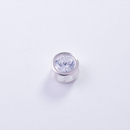 Dije punto de luz engastado en Plata