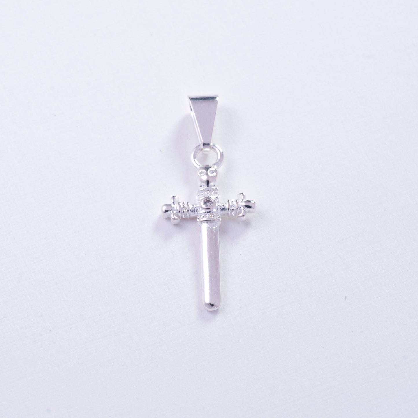 Dije de espada en Plata