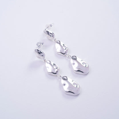 Aros de gotas irregulares en Plata