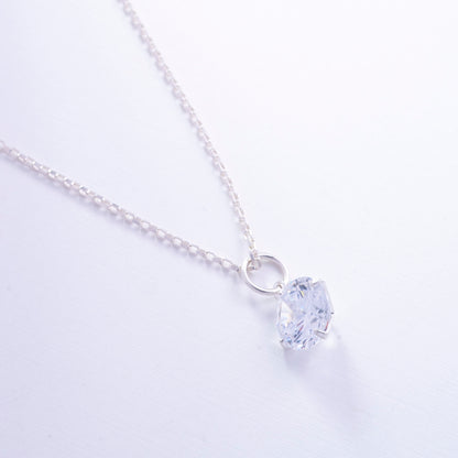 Dije punto de luz circón en Plata