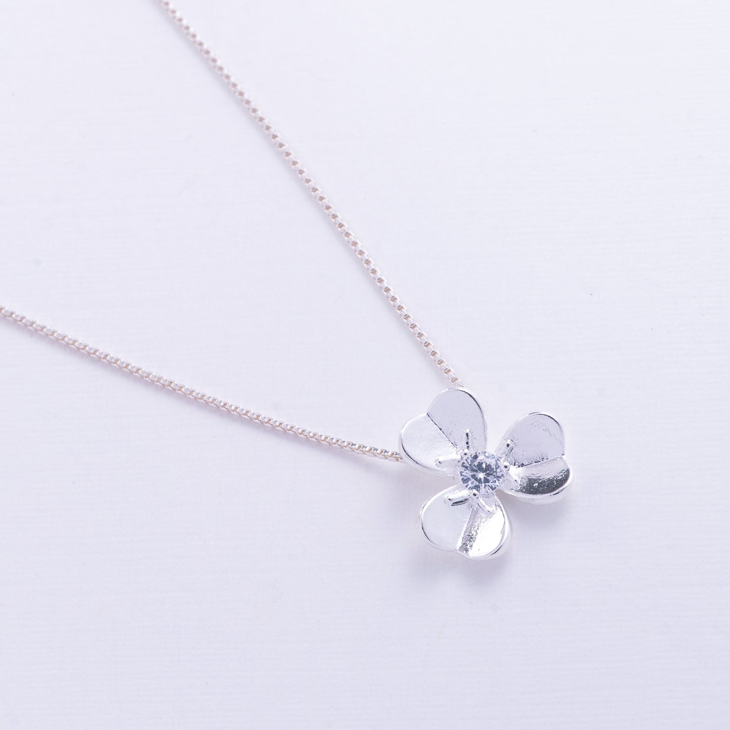 Dije mini flor en Plata