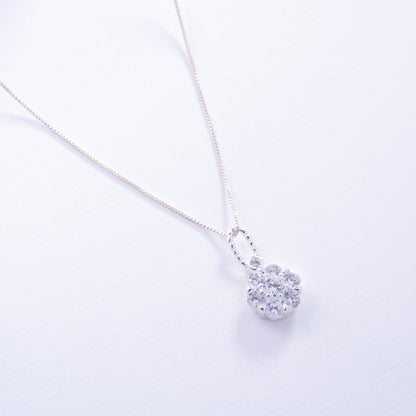 Dije flor mini con circones en Plata