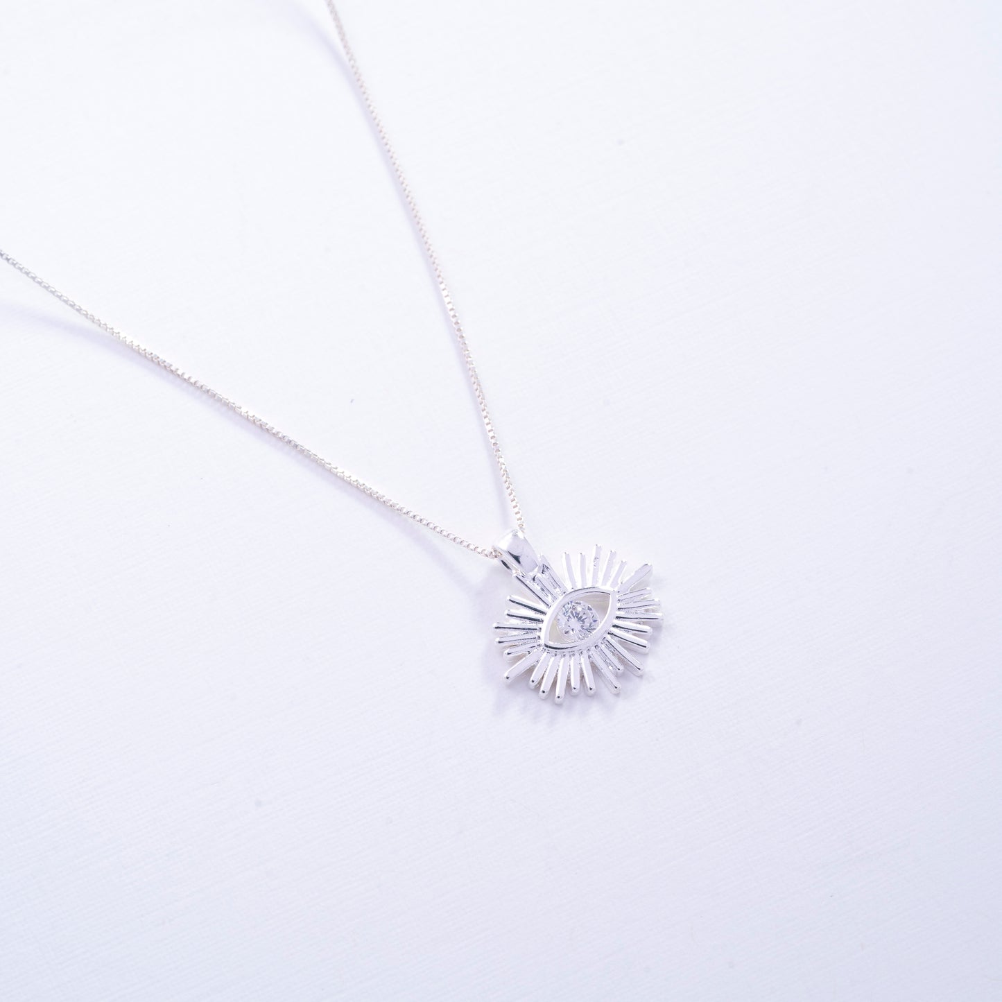 Dije de ojo protector en Plata