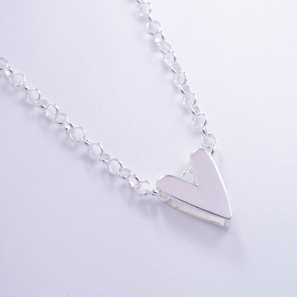 Dije de corazón pulido en Plata