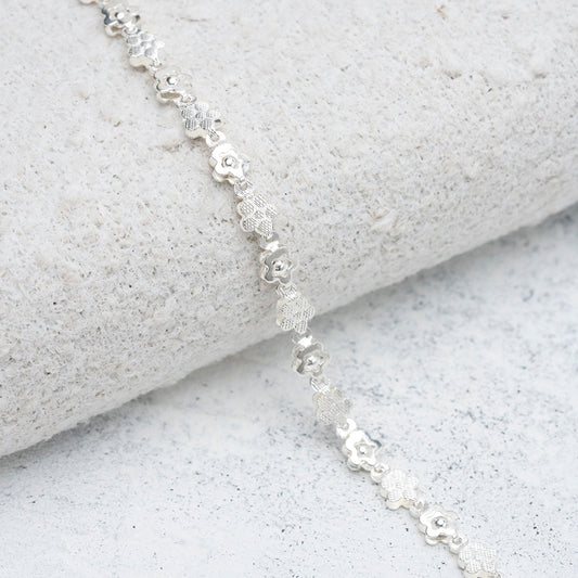 Pulsera tejida de flores en Plata