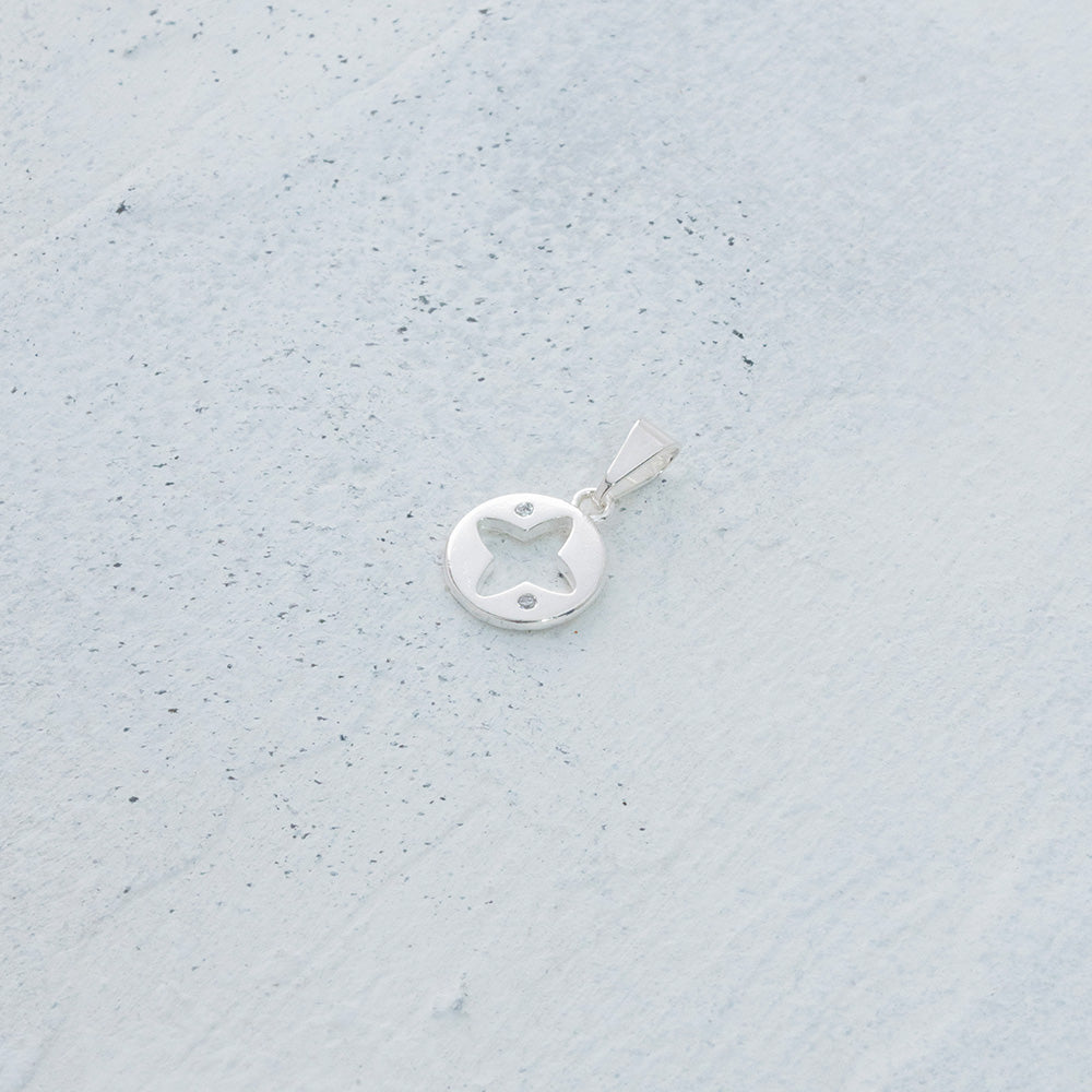 Dije estrella de cuatro puntas en Plata