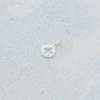 Dije estrella de cuatro puntas en Plata