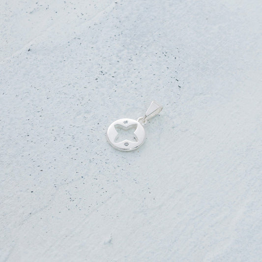 Dije estrella de cuatro puntas en Plata