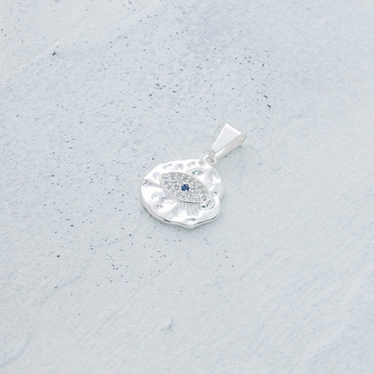 Dije de ojo circular en Plata