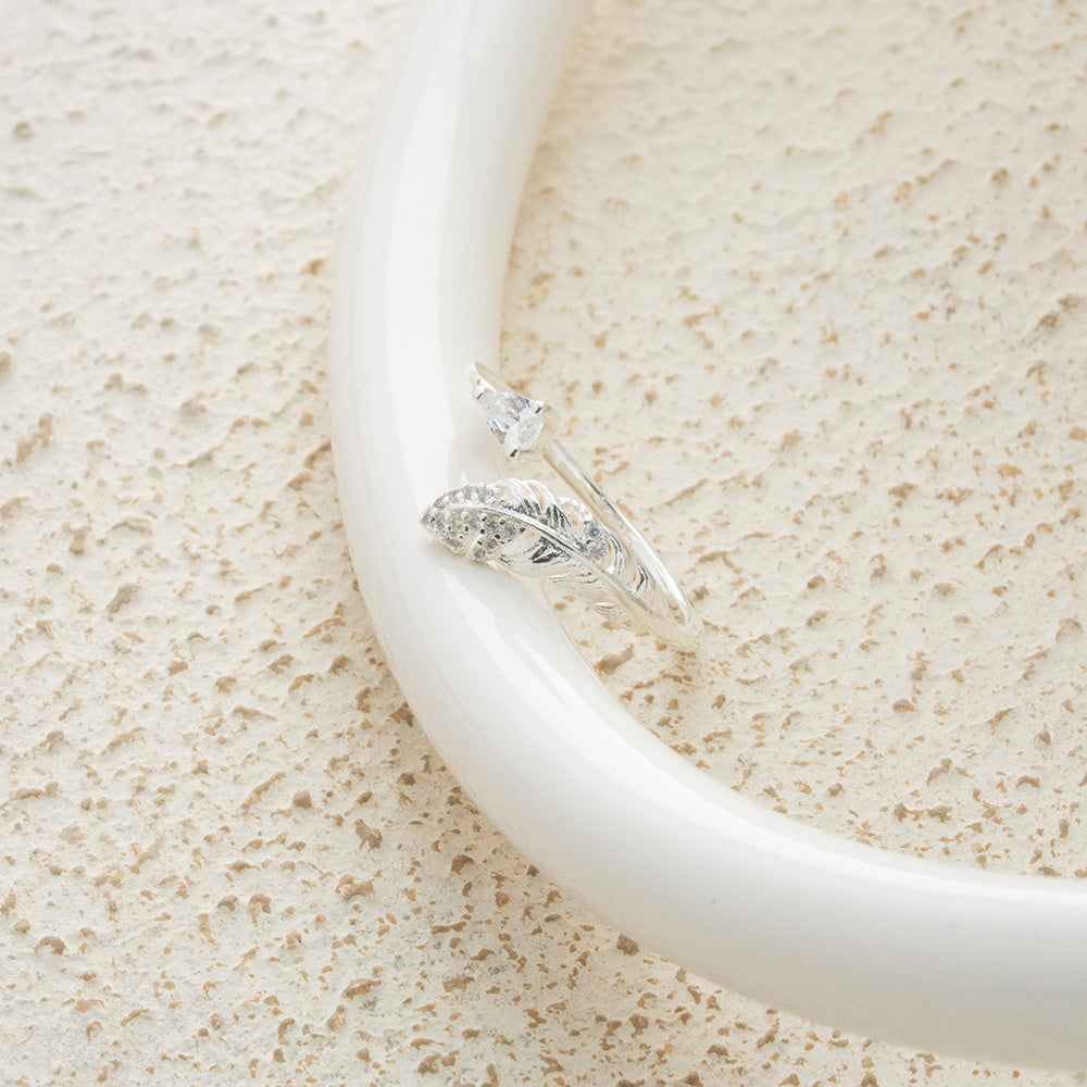 Anillo pluma con circones en Plata