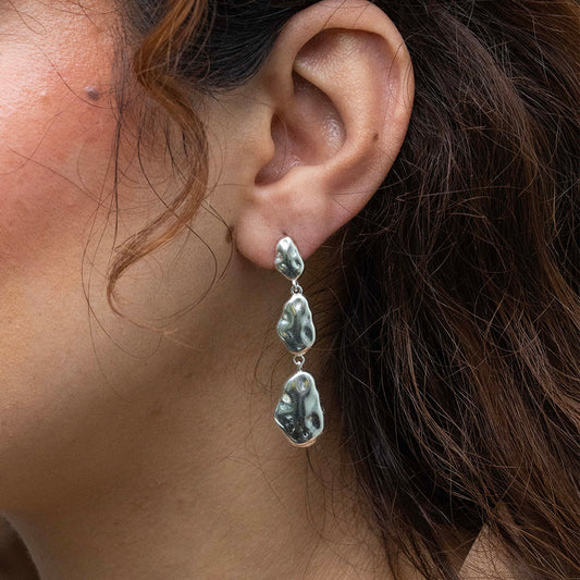 Aros de gotas irregulares en Plata