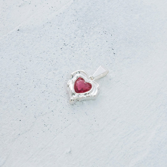 Dije de corazón derretido en Plata