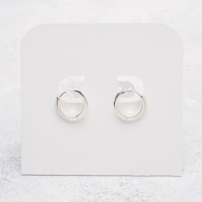 Argollas circulares con circones en Plata