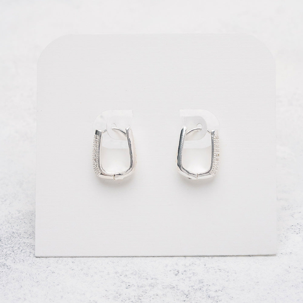 Argollas cuadradas gruesas con circones en Plata