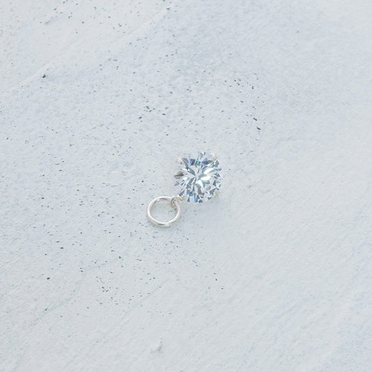 Dije punto de luz circón en Plata