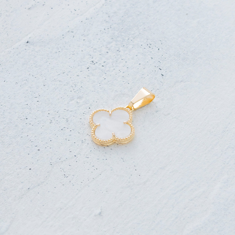 Dije de flor beige en Goldfield