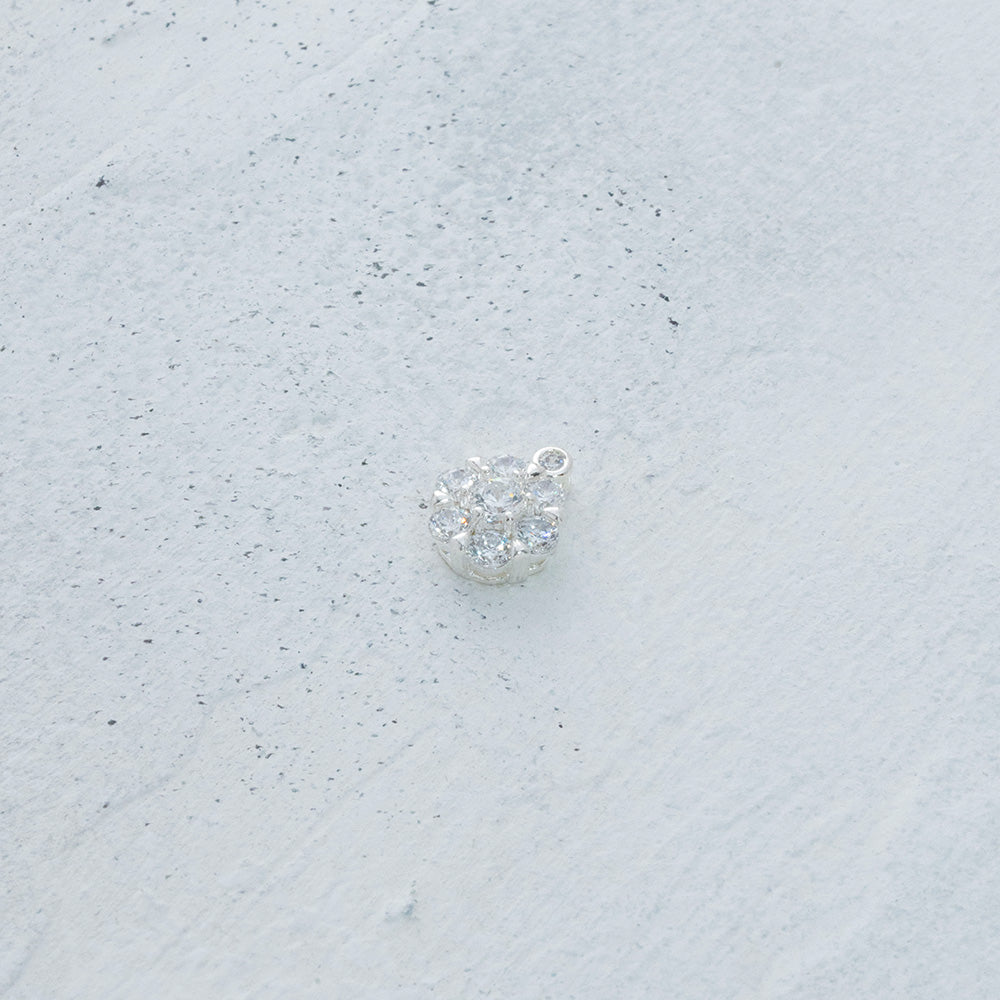 Dije flor mini con circones en Plata