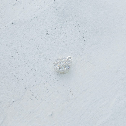 Dije flor mini con circones en Plata