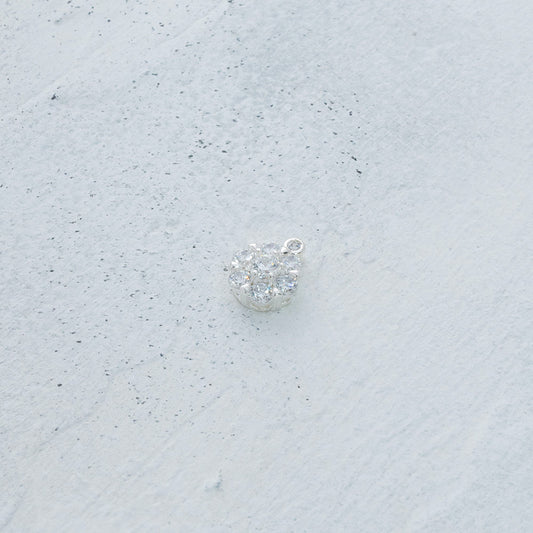 Dije flor mini con circones en Plata