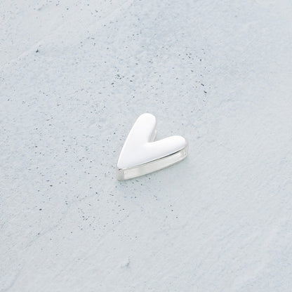 Dije de corazón pulido en Plata